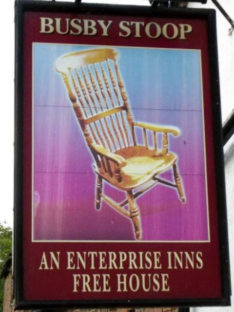 Busby Stoop pub sign, featuring the infamous chair