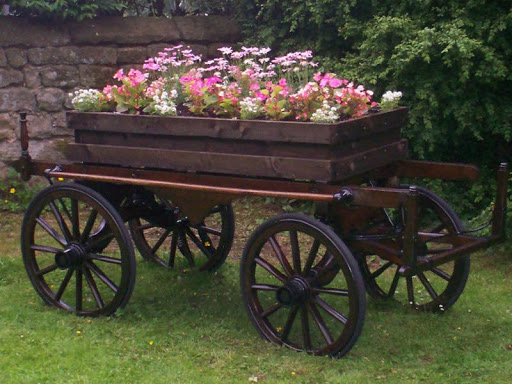 Bier supporting floral display in Hampsthwaite Churchyard, England