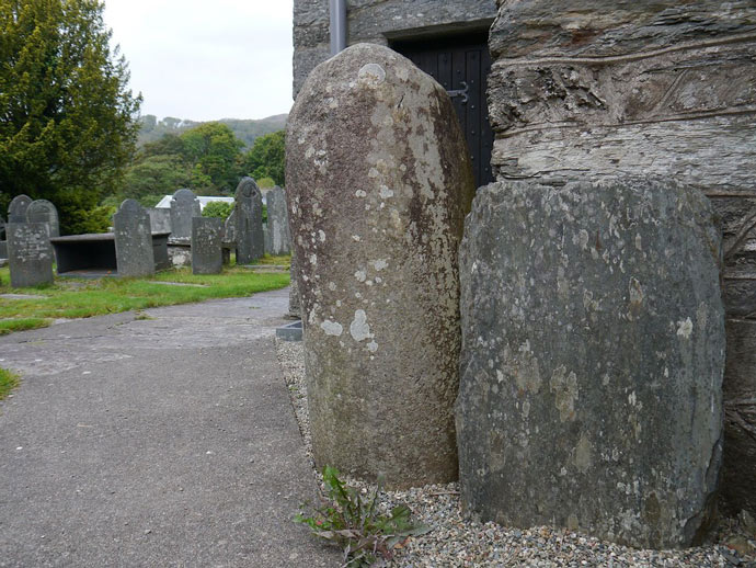 Standing stone in St Twrog's Churchyard, Gywnedd, Wales, Britain